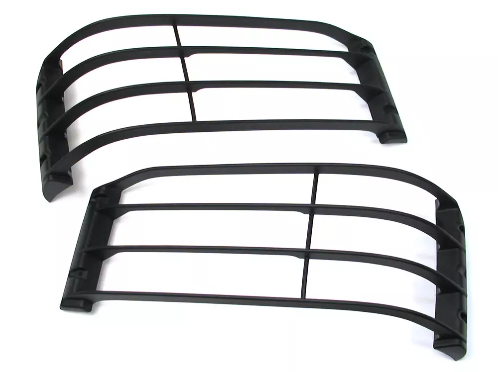 LAND ROVER LR4 DISCOVERY 4 2010-14 GENUINE FRONT LIGHT GUARD SET PAIR
